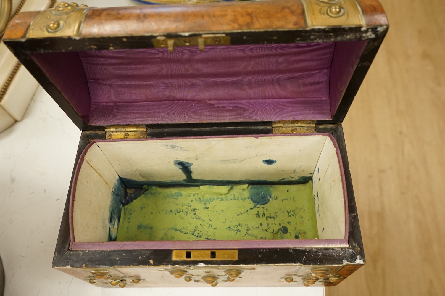 A brass mounted walnut dome topped box and another bone and mother of pearl inlaid box, 32 x 25cm